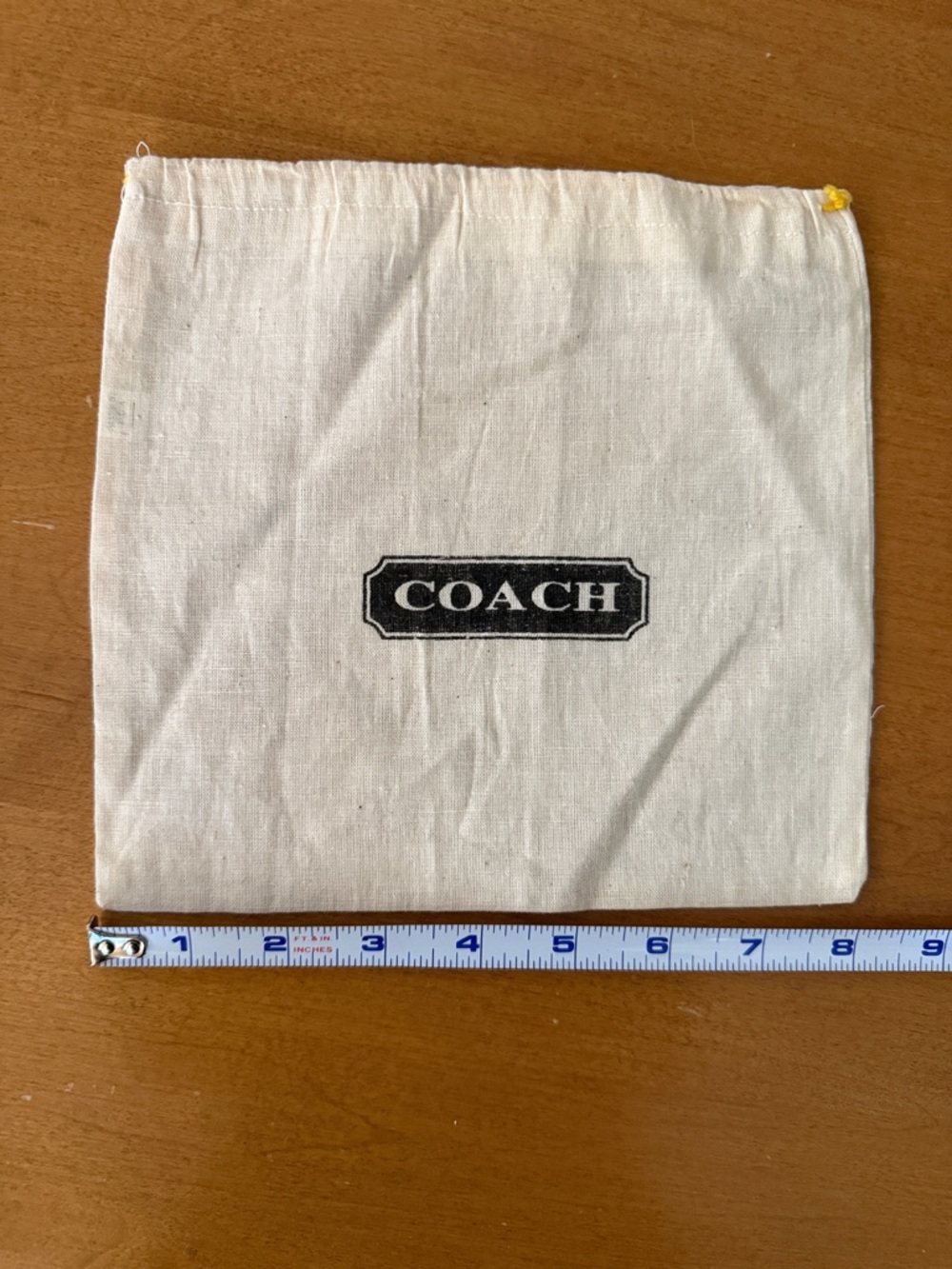 Coach Cream Canvas Drawstring Bag with Black Logo